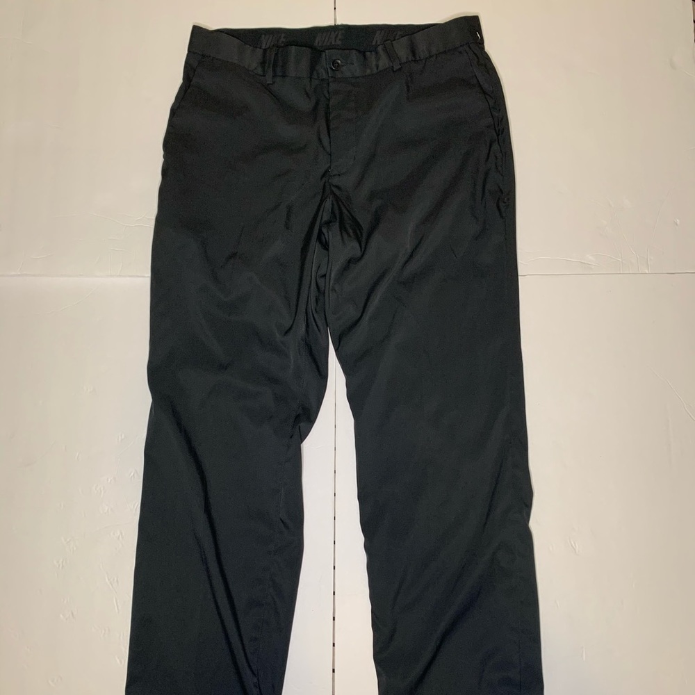 Black Nike slacks